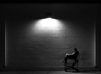 Person sitting in shopping cart