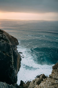 Scenic view of sea against sky during sunset