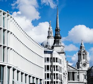 Low angle view of building against blue sky