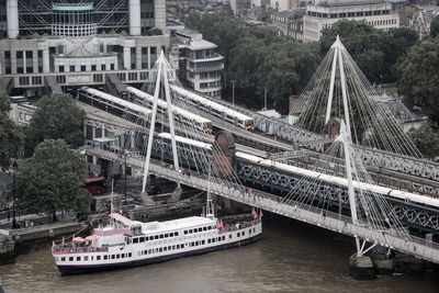 High angle view of golden jubilee bridge over thames river in city