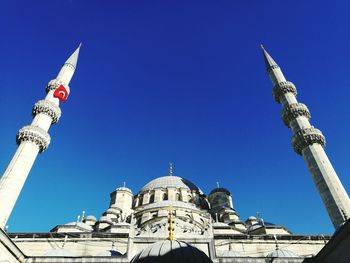 Low angle view of traditional building against clear blue sky