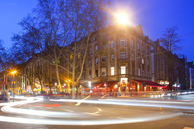 Light trails on city street at night