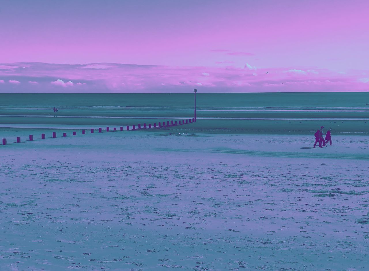 SCENIC VIEW OF SEA AGAINST SKY AT SUNSET