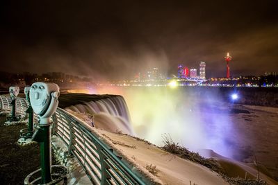 View of illuminated city at night