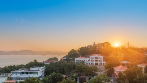 View of buildings at sunset