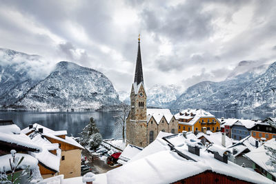 Panoramic view of frozen lake against sky