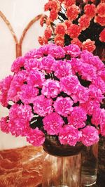 Close-up of pink flowers on table