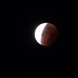 Low angle view of moon in sky