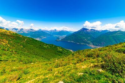 View of lake como, looking north, from santa maria rezzonico, with alps, villages and mountains.