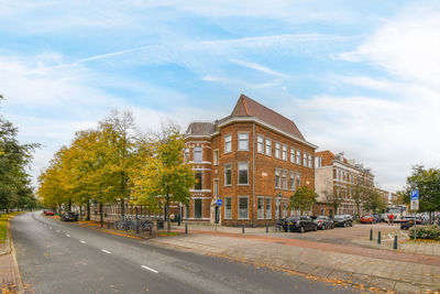 Buildings in city against sky