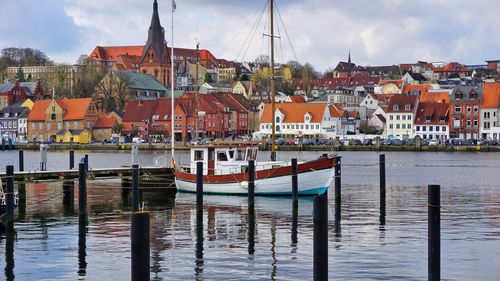 Boat moored at harbor in flensburg