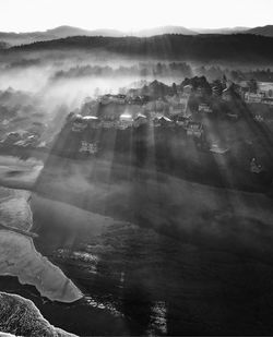 Aerial view of cityscape against sky