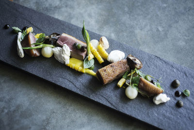 High angle view of vegetables on cutting board