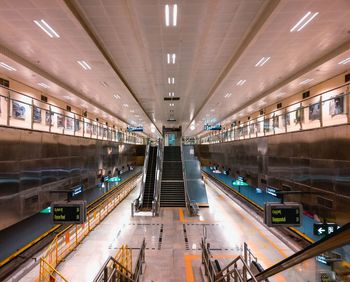 Interior of illuminated railroad station