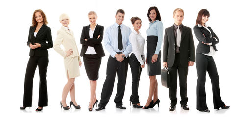 Portrait of friends standing against white background