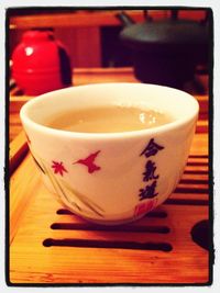 Close-up of coffee cup on table