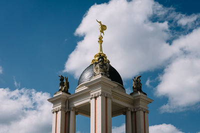 Low angle view of statue against sky