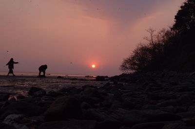 Scenic view of sea against sky at sunset