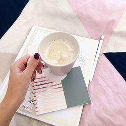 High angle view of coffee cup on table