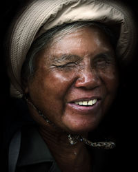 Close-up portrait of a smiling young woman