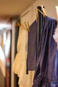 Clothes hanging on rack at home