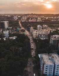 High angle view of buildings against sky at sunset