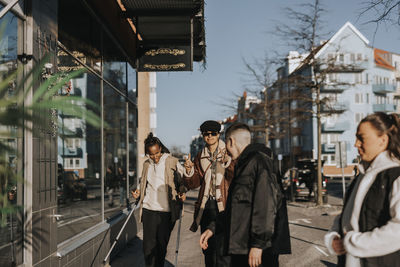 Friends standing at street