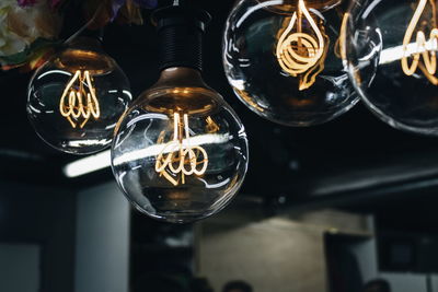 Close-up of illuminated light bulb