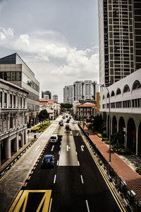 Road in city against sky