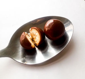 High angle view of breakfast on table against white background