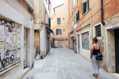 Man walking on street in city