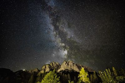 Low angle view of star field against sky at night