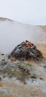 Rocks on land against sky