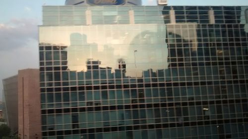 Low angle view of modern building against sky