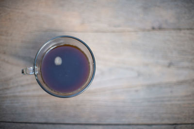 High angle view of coffee cup on table