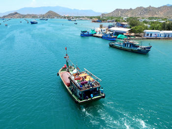 High angle view of people sailing on sea