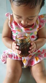 High angle view of girl holding ice cream