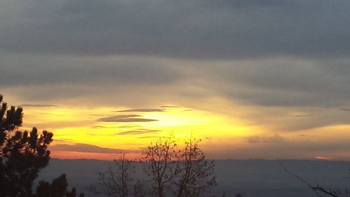 Scenic view of silhouette landscape against sky during sunset