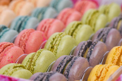 Close-up of multi colored macarons for sale