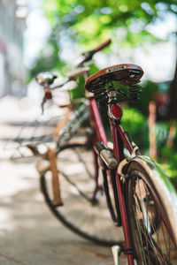 Close-up of bicycle parked on road