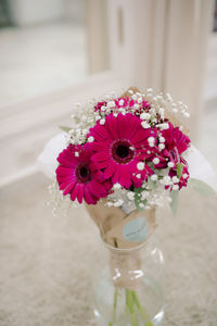 Close-up of flower vase on table