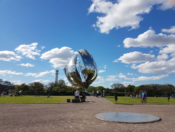 People in park against sky