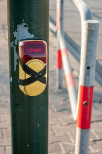 Close-up of traffic sign on road