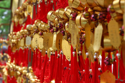 Close-up of christmas decorations hanging for sale