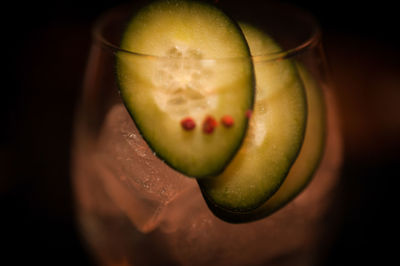 Close-up of fruit over black background