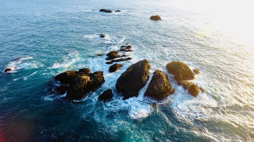 Scenic view of rocks in sea