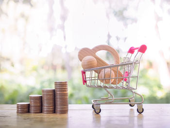 Close-up of shopping cart on table