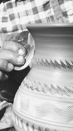 High angle view of hand holding paper