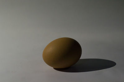 Low angle view of apple against white background