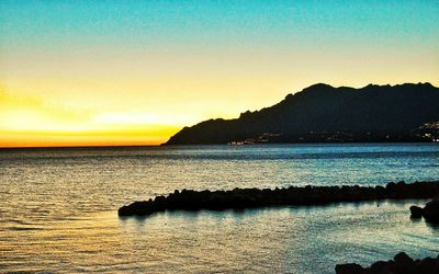 Scenic view of sea against sky during sunset